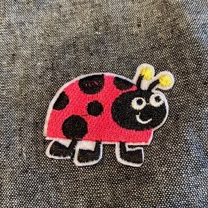 Cute lady bug appliqué iron patch.